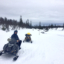 Med snöskoter i fjällen